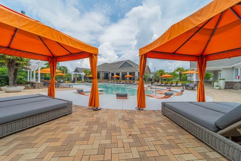 Sparkling swimming pool and spacious sundeck at The Oxmoor in Birmingham, AL